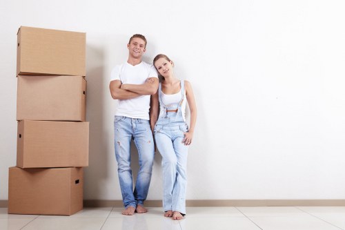 Man and van removals service in Deptford with moving van and boxes