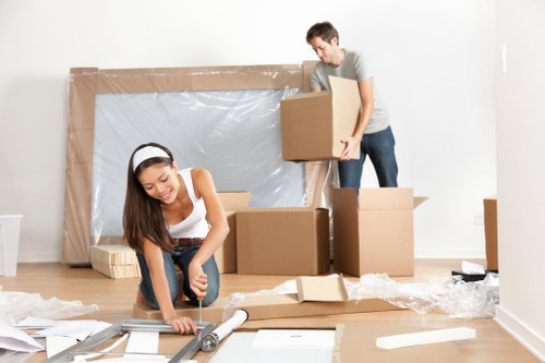 Local removals van and moving boxes in Deptford