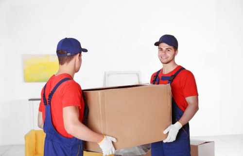 A Deptford relocation scene showing packing and unpacking services in progress