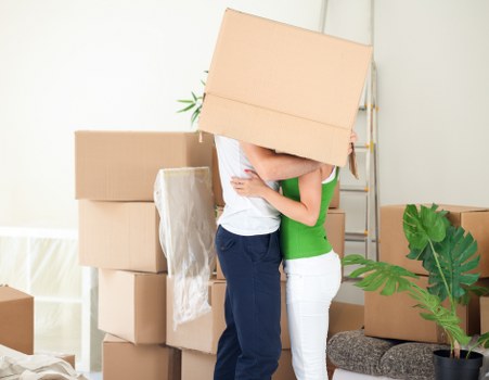 Local moving team handling boxes and furniture in Deptford